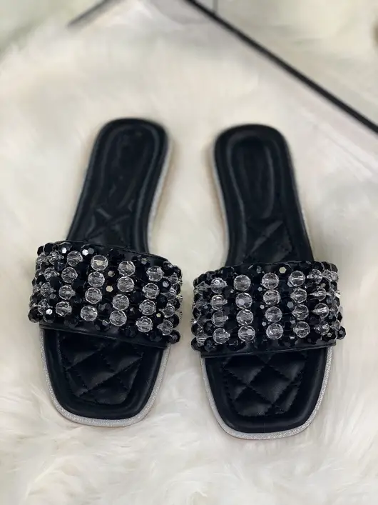AUDRINA QUILTED SLIP ON SLIDER SANDALS IN BLACK
