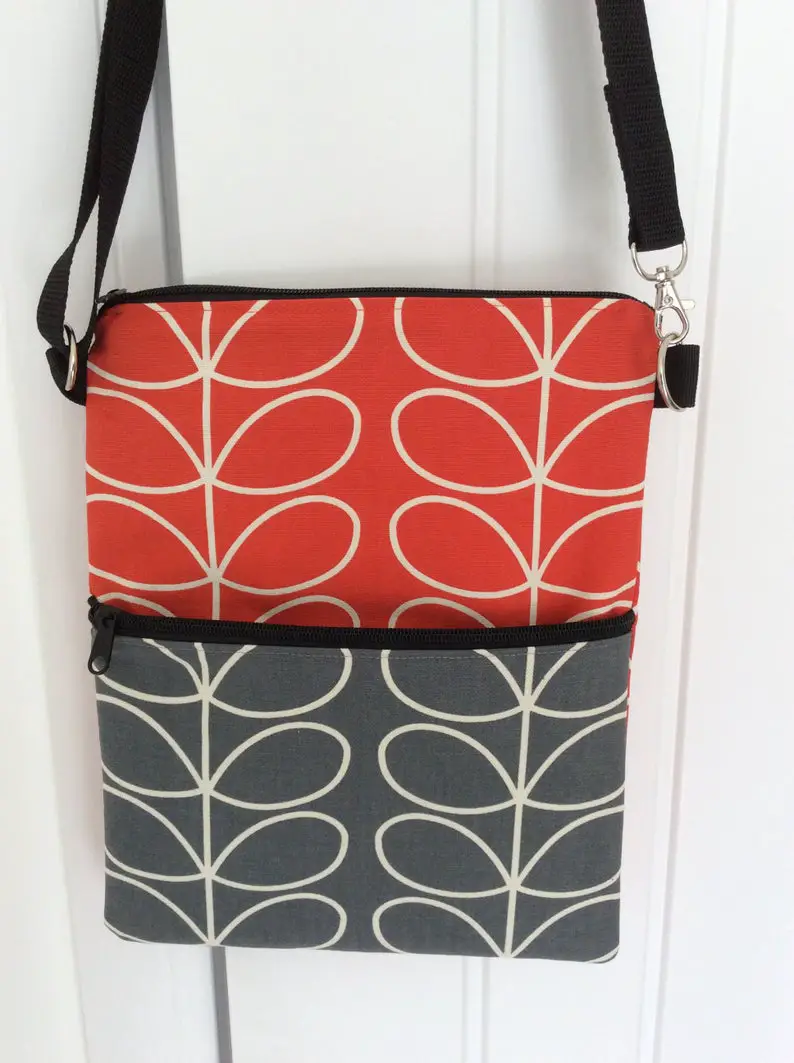 Cross body bag with four pockets in Orla Kiely patterned fabric
