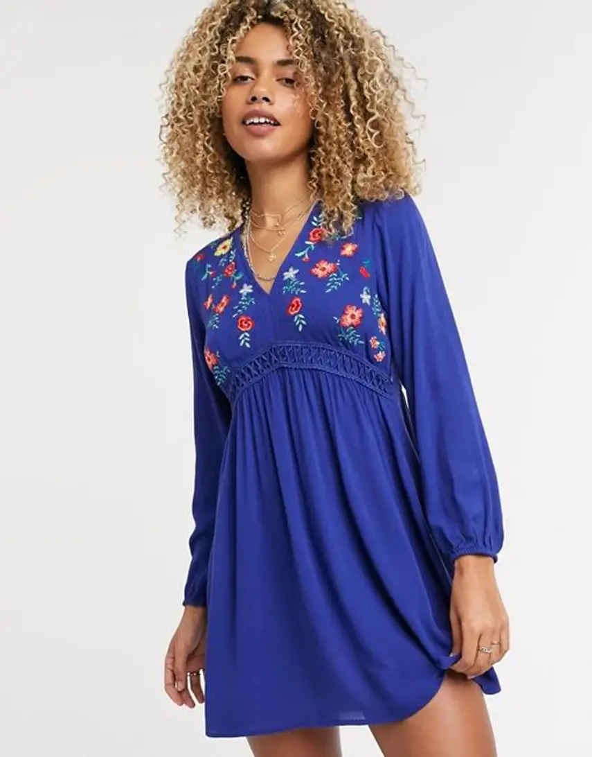 En Crème swing dress with ladder inserts and floral embroidery