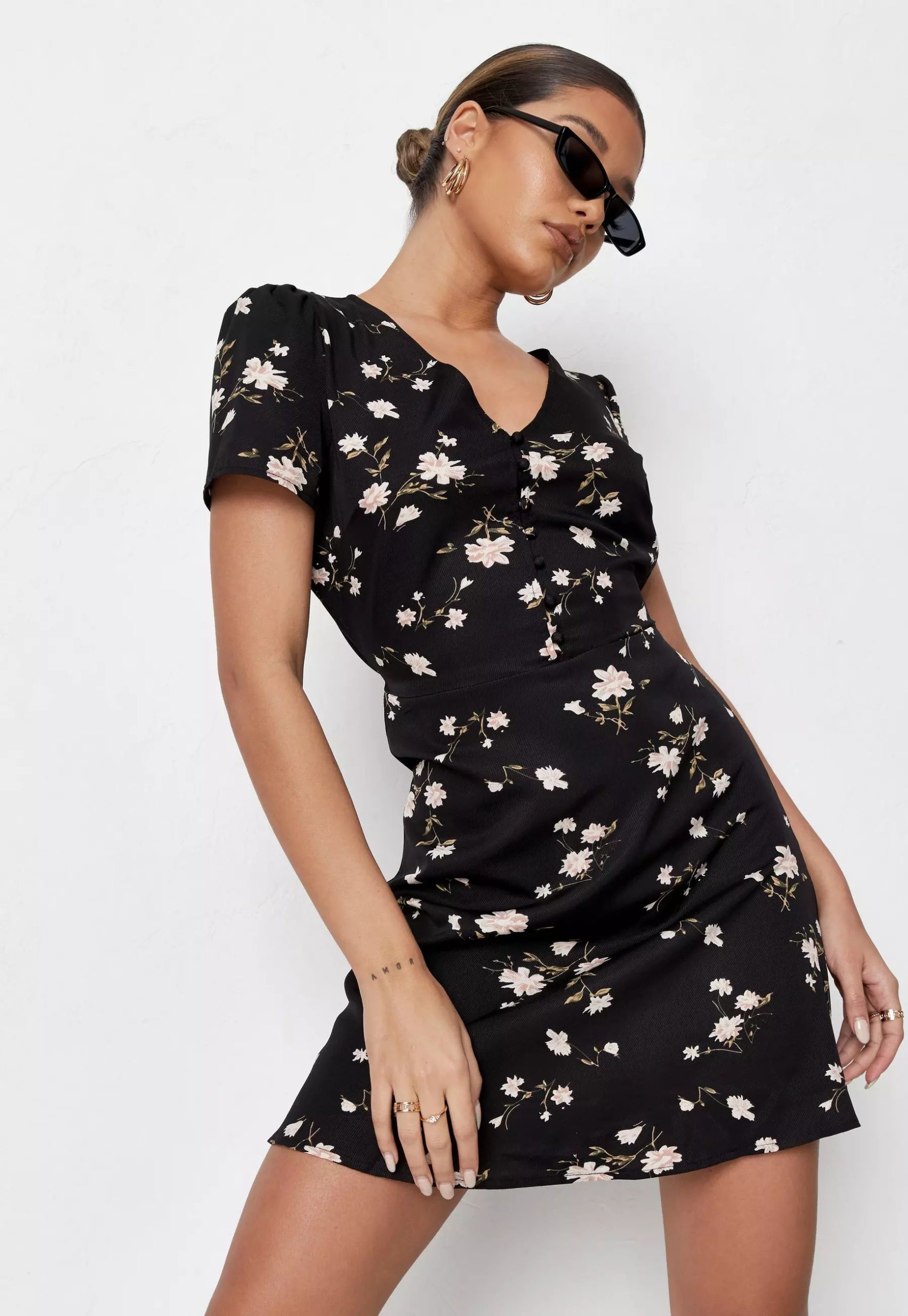 black floral print half button tea dress