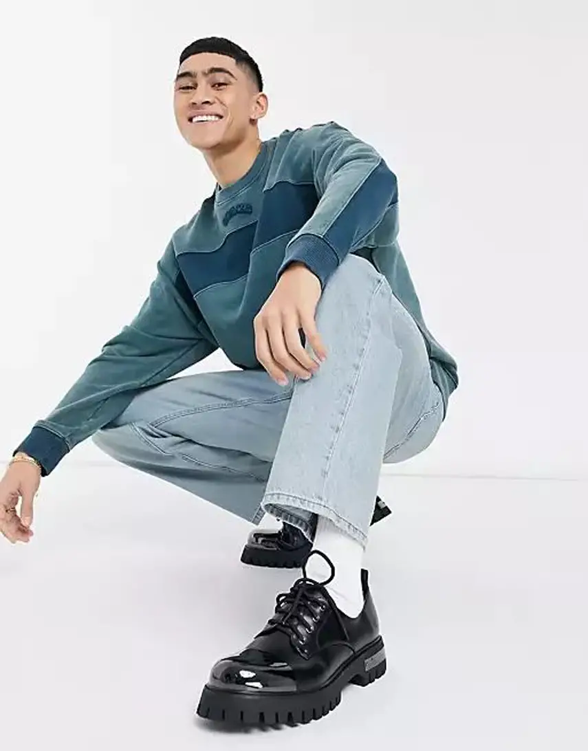 ASOS DESIGN baggy jeans in tinted light wash blue