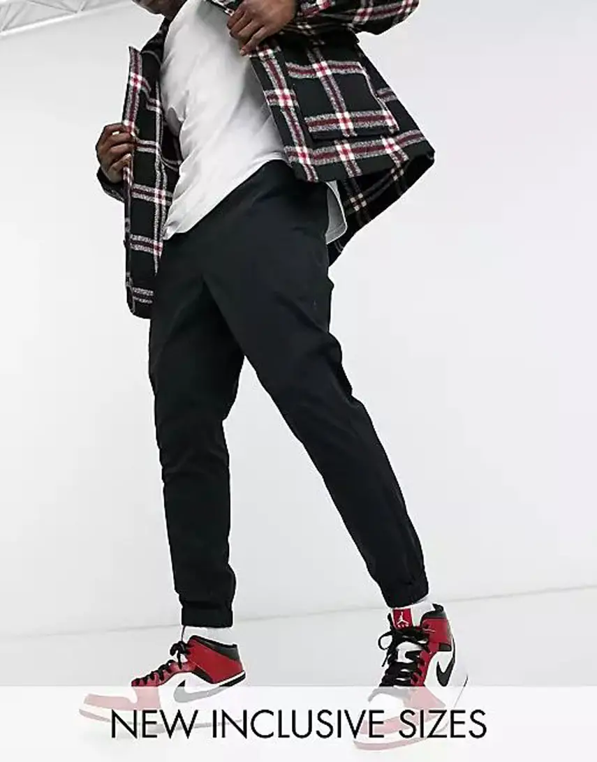 ASOS DESIGN tapered chino joggers with elasticated waist in black